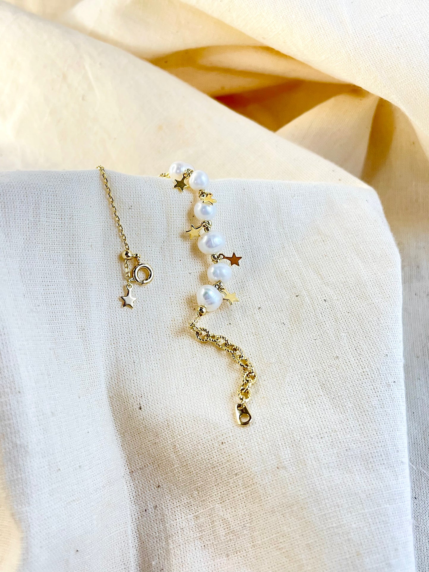 Pulso Perlas Estrellas