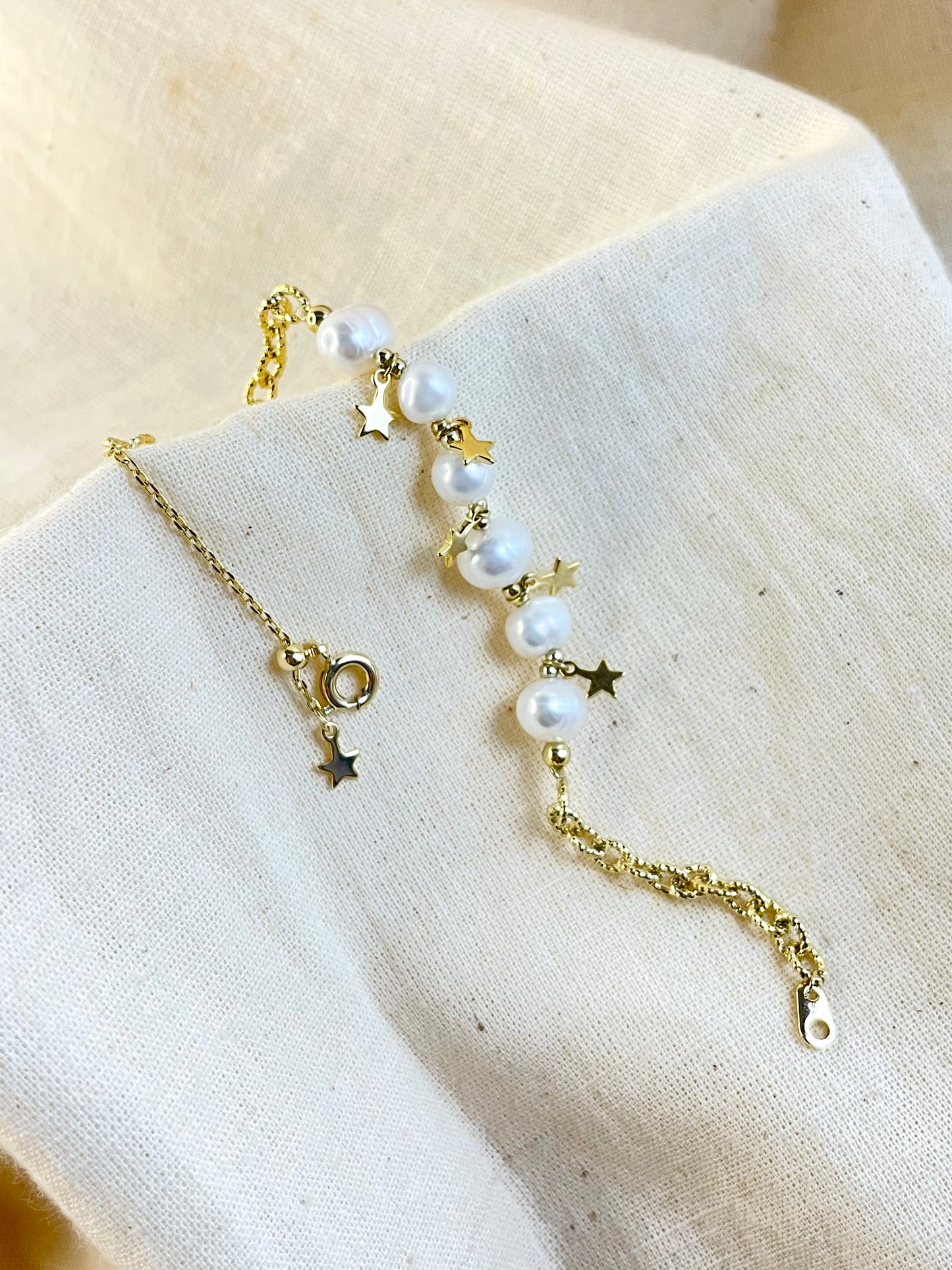 Pulso Perlas Estrellas
