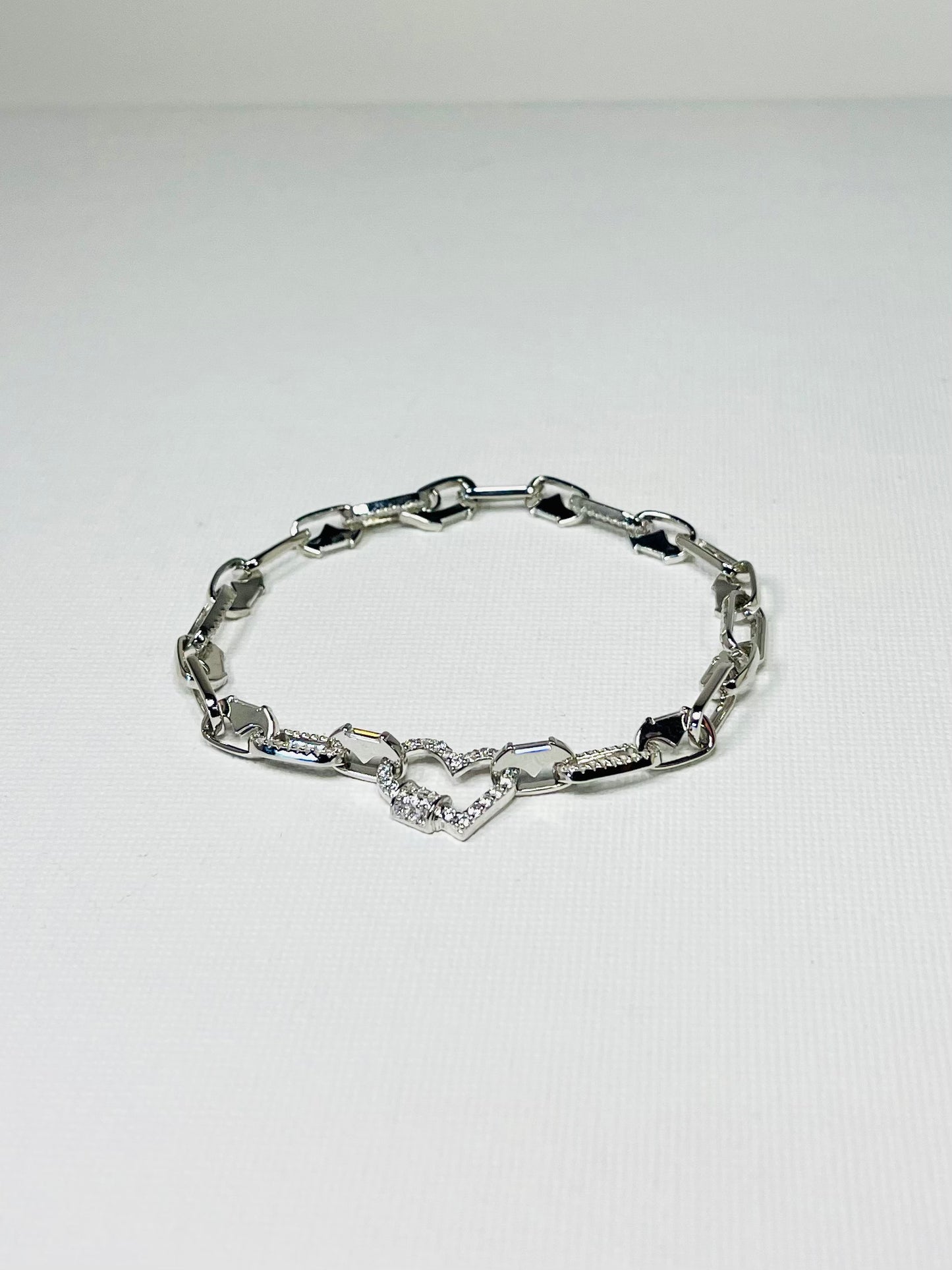 Pulso-Eslabones-Corazón-Zircones Pulso de eslabones pulidos y con zircones,un corazón al centro,7.5",Pl 925